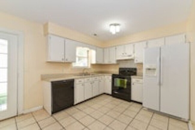 Building Photo - Pet Friendly - Fully Fenced in Yard with Two Storage Buildings