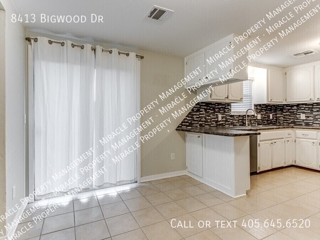 Building Photo - 8413 Bigwood Dr