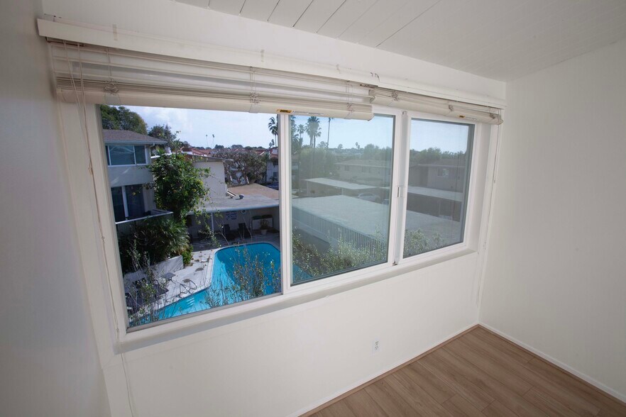 Bedroom 1 has views of the pool and is big and bright - 478 Seaward Rd