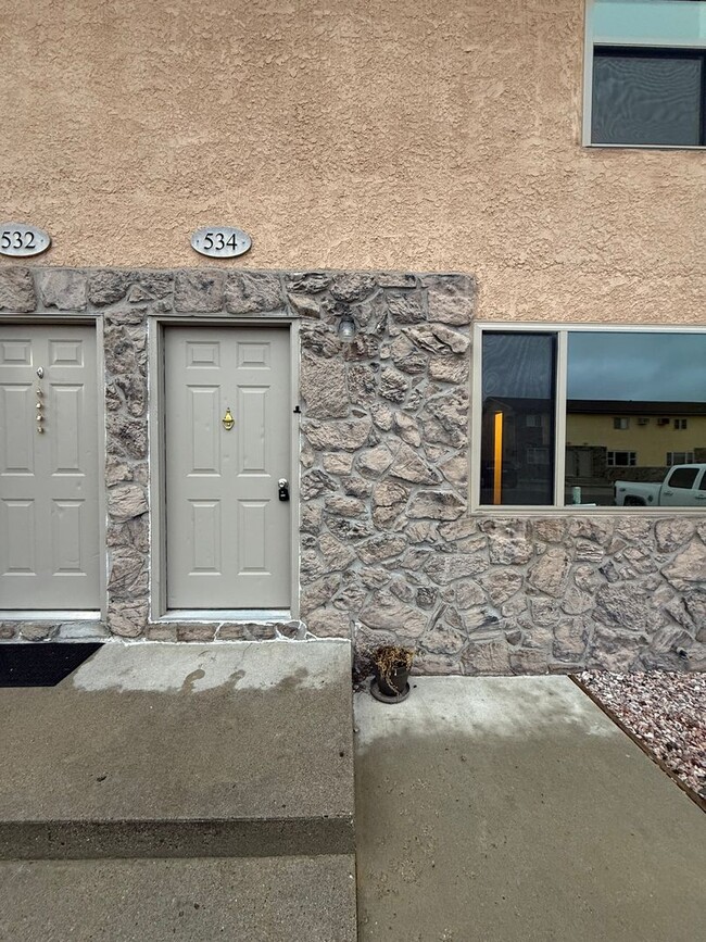 Building Photo - Two bedroom, one and bathroom townhome loc...
