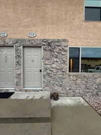 Building Photo - Two bedroom, one and bathroom townhome loc...