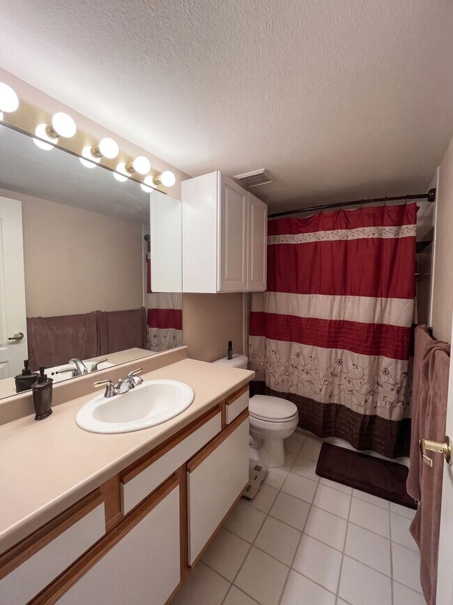Building Photo - Two-Bedroom Condo with Attached Garage, Available Now