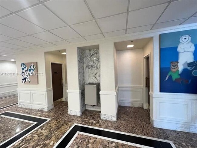 Building Photo - 5600 Collins Ave