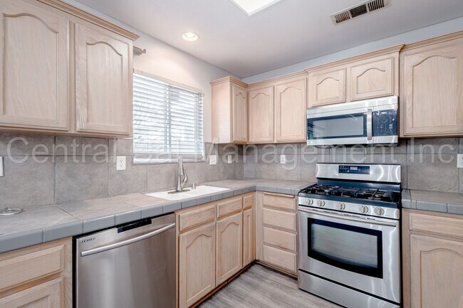 Building Photo - 3 Bedroom/2 Bath with a Pool and Solar - $...