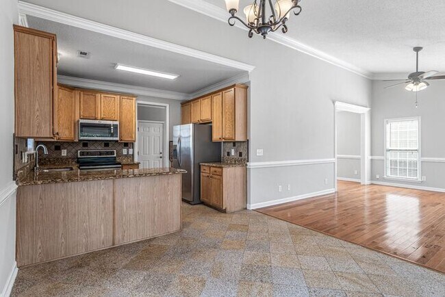Building Photo - W. Wendover, Beautiful Home, Granite Counter-Tops, SS Appliances, Hardwoods, FP, Deck, Fenced, Ga...