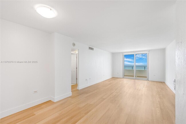 Building Photo - 5555 Collins Ave