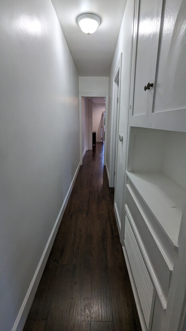 Hallway between kitchen, and bedrooms - 1122 E Harvard St