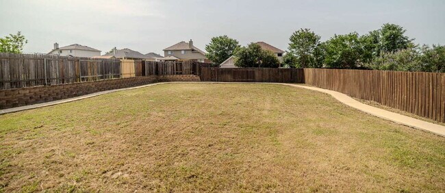 Building Photo - "Spacious 4-Bedroom Retreat with 2.5 Baths...