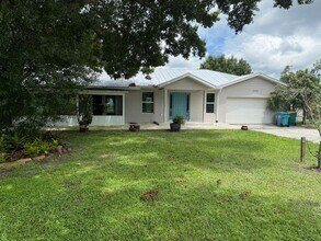 Building Photo - Waterfront Oasis Awaits!  3/2 with Attache...