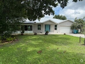 Building Photo - Waterfront Oasis Awaits!  3/2 with Attache...
