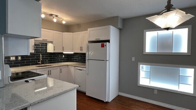 Building Photo - 12057 E Harvard Ave