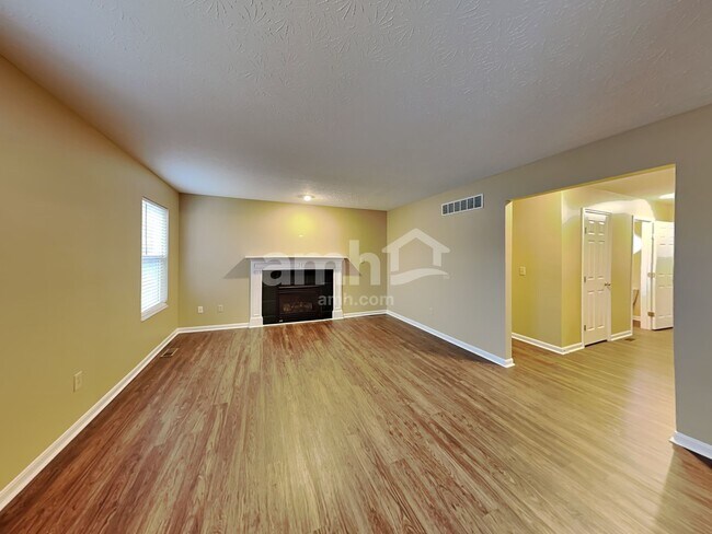 Building Photo - 6312 Satin Wood Dr