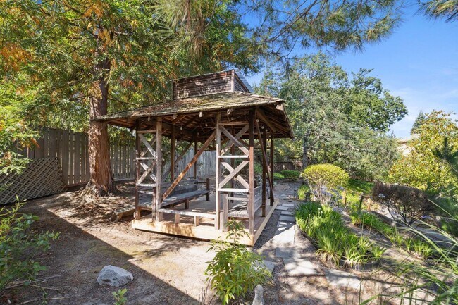 Building Photo - Elegant Two-Story Home with Backyard Oasis...