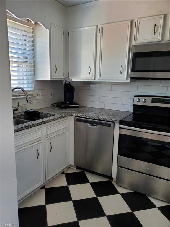 Building Photo - "Charming 2-Bed, 2-Bath Condo Retreat in Prime Winston-Salem Location"