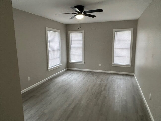 This bedroom could be a bedroom, office or playroom! - 2245 E Overton Rd
