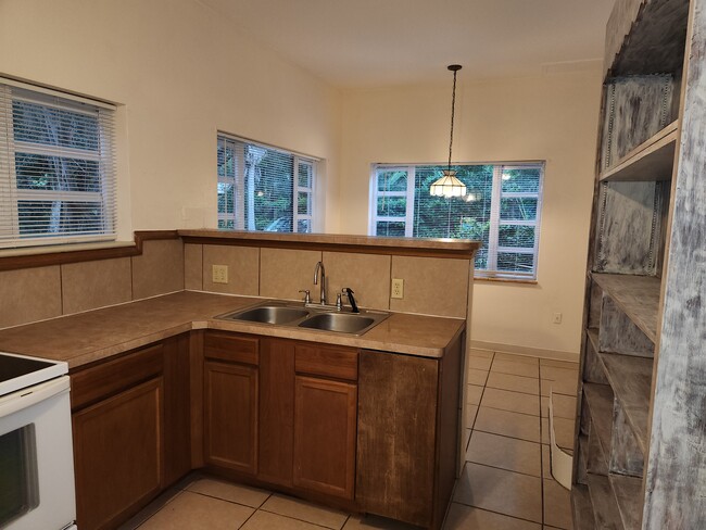 Kitchen (remodel will bring new cabinets, layout) Also has a large pantry - 6906 Coach St