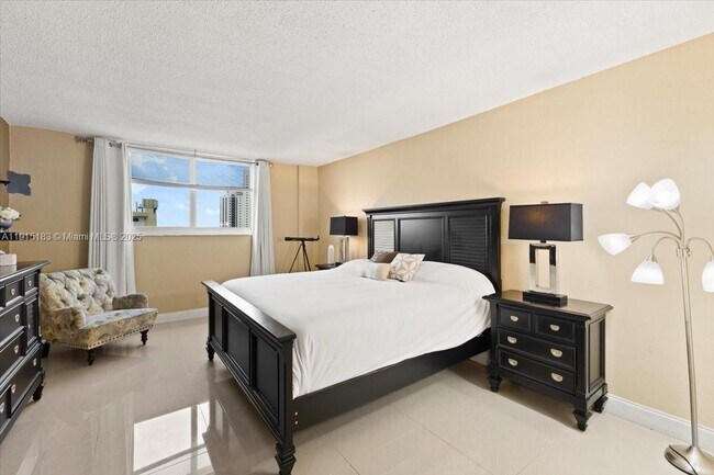 Building Photo - 19380 Collins Ave