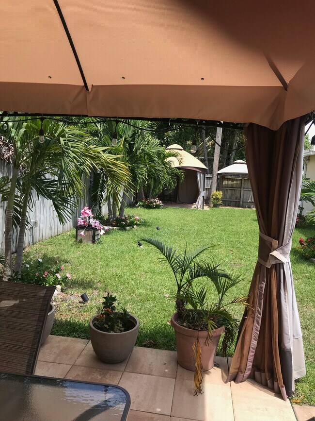 two gazebos in backyard - 1473 NE 48th St