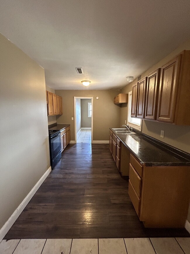 Building Photo - "Charming 4-Bedroom Home in Jonesboro with Cozy Fireplace & Gleaming Hardwood Floors!"