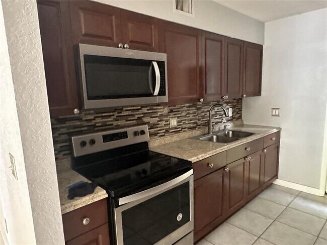 Building Photo - 3720-3726 NW 115th Way