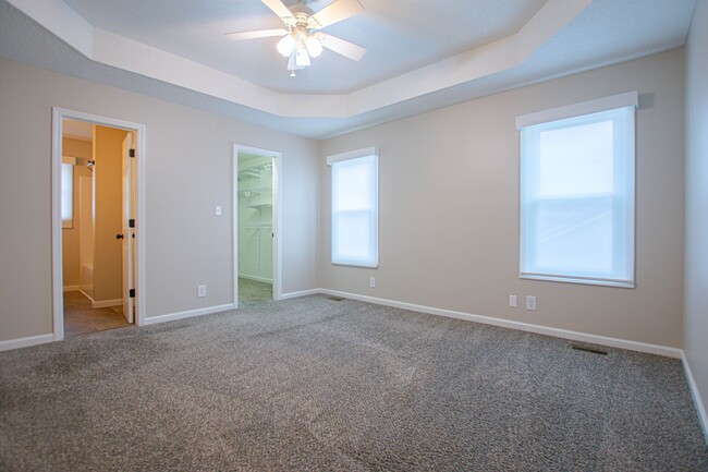 Building Photo - Pet Friendly Three Bedroom with Bonus!