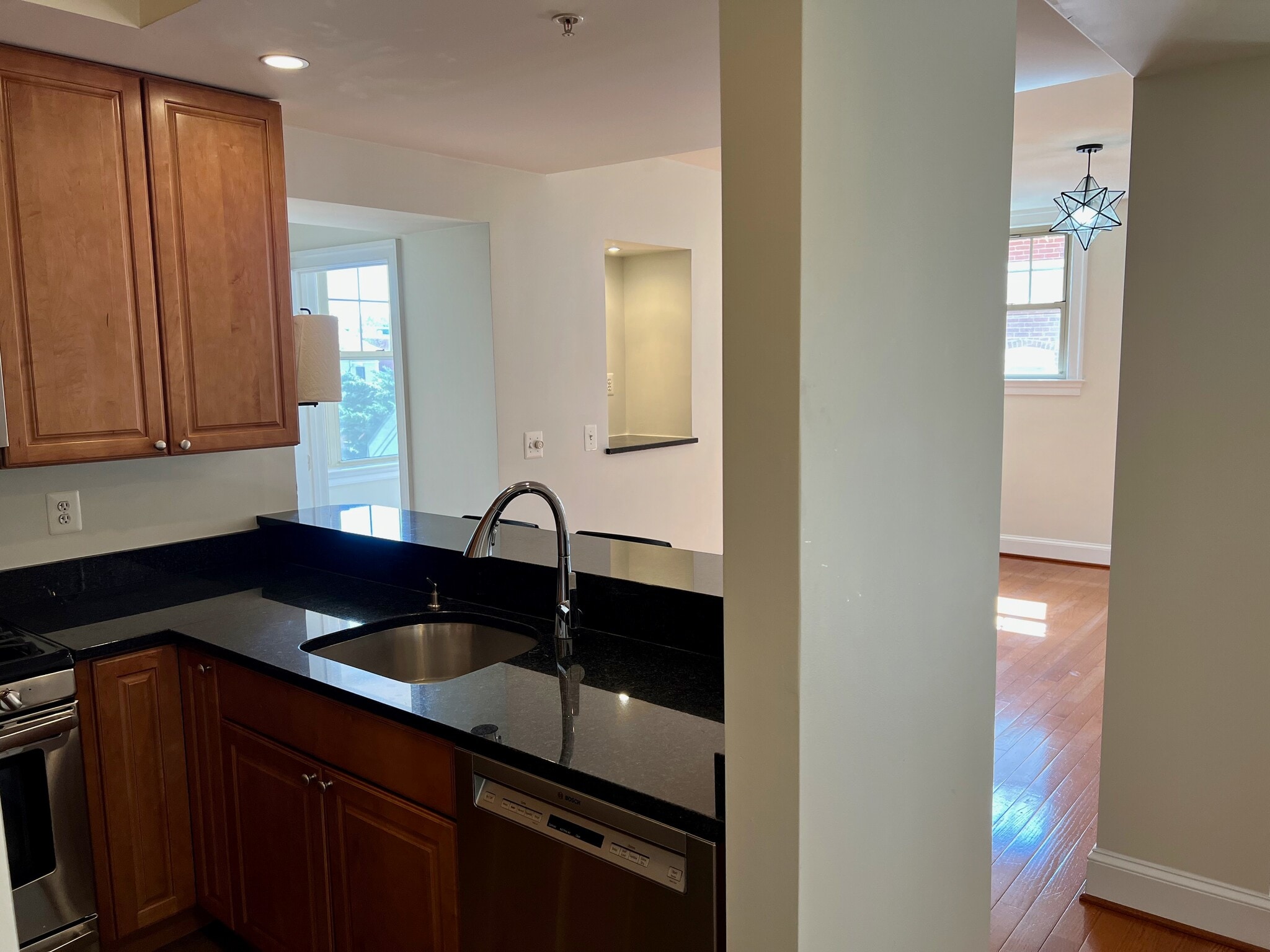 View from Guest Bathroom into Kitchen and Living Room - 3220 17th St NW