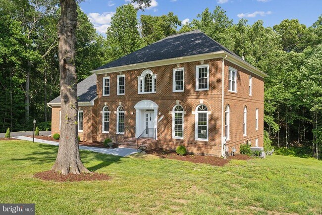 Building Photo - 10899 Woodland Falls Dr