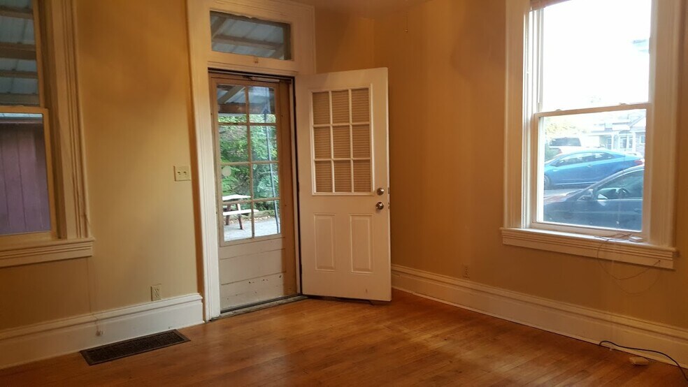 Living rm & outside porch & back entry - 404 W Court St