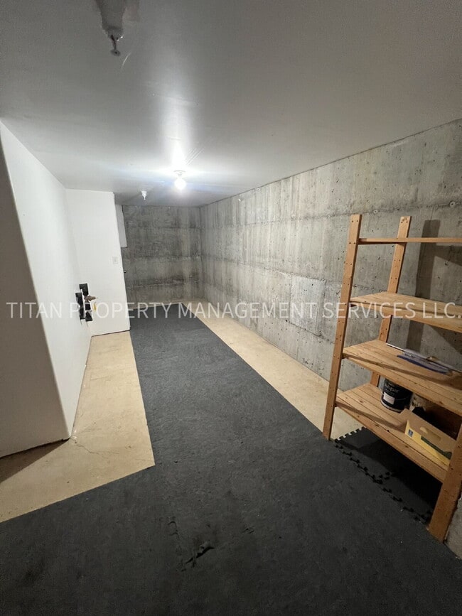 Building Photo - Beautiful Three Story Townhouse with Gas Fireplace, Balcony & 2-Car Garage