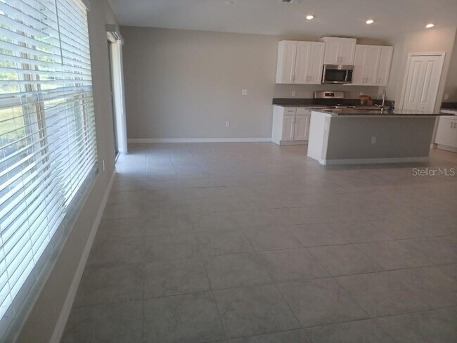 Building Photo - 5428 Amaryllis Garden St