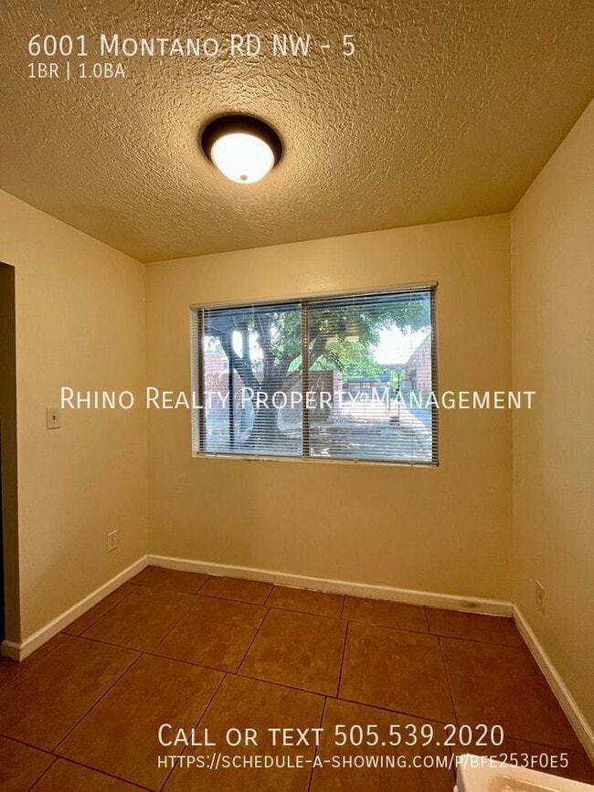 Building Photo - 6001 Montaño Rd NW