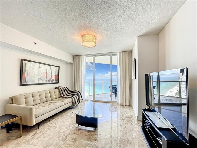 Building Photo - 16699 Collins Ave