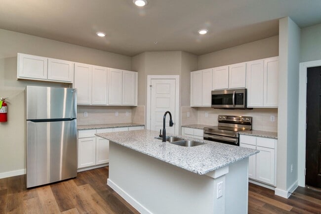 Building Photo - GORGEOUS 2 BEDROOM FOUR PLEX LOCATED IN MI...
