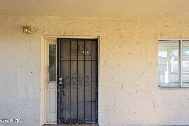 Building Photo - 3408 W Port Au Prince Ln