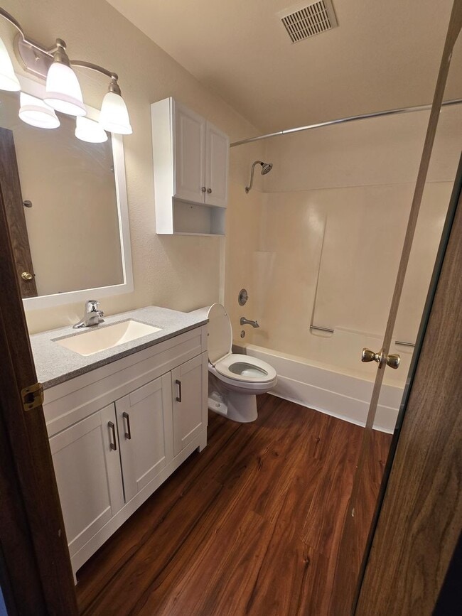 Building Photo - READY NOW. Huge backyard, lovely two bedro...