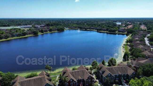 Building Photo - 9068 Lake Chase Island Way