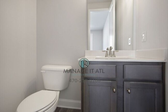 Building Photo - Modern 3-level Townhome featuring 4 bedrooms and 3 1/2 baths