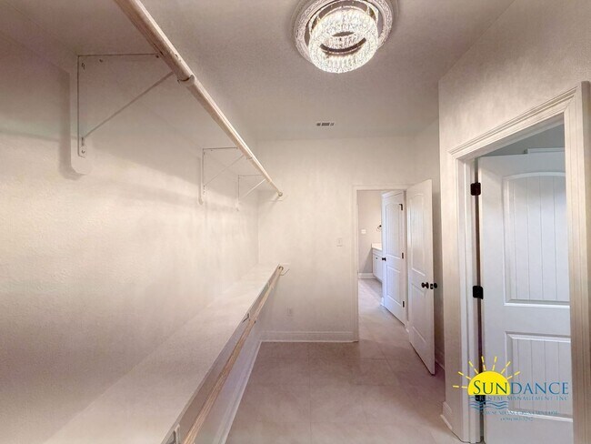 Building Photo - Custom-crafted details shine throughout this stunning 3-bedroom home in Magnolia at the Bluffs in...