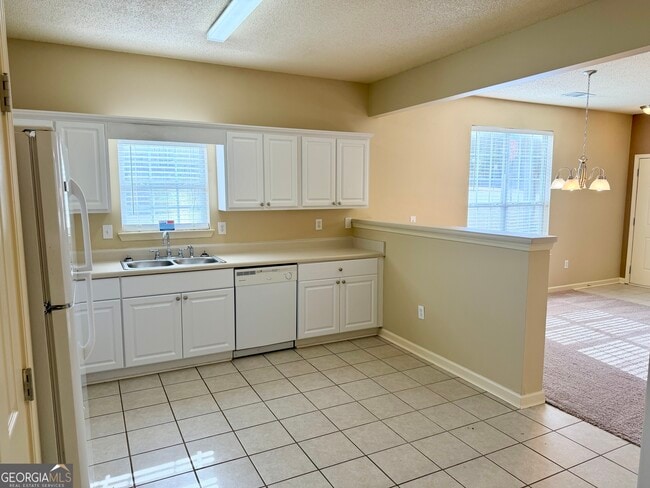 Building Photo - 115 Odyssey Turn NW