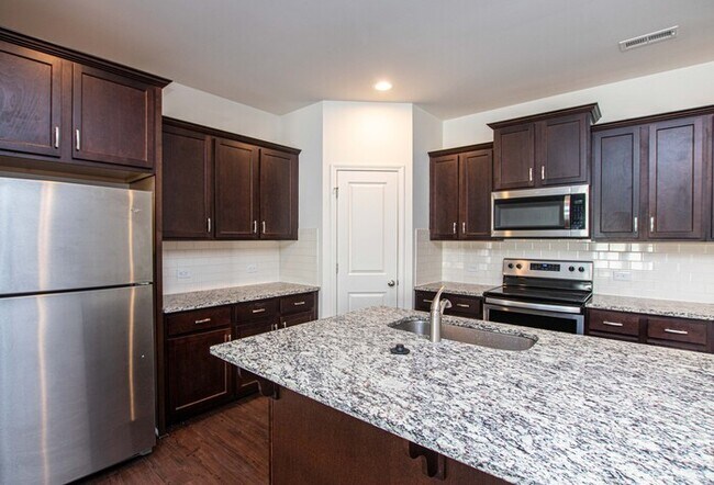 Building Photo - 2-Car Garage Bonterra Townhome