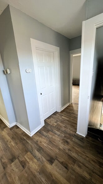 Top of stairs facing bathroom (closed door), left is to the kitchen/living room,open door master bed - 414 Erie Ave