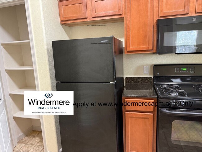 Building Photo - Absolute MUST See Condo In Immaculate Condition With Open Flowing Floor Plan!