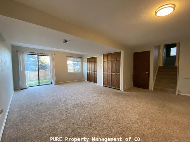 Building Photo - Large home in Highlands Ranch!! 4 bedrooms, 2 baths! 2-car garage!!