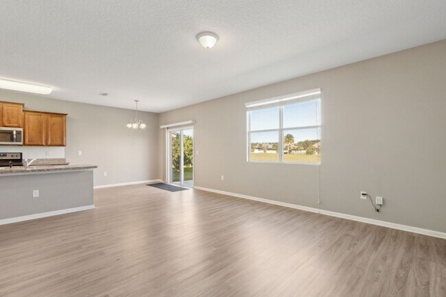 Building Photo - Spacious 5-Bedroom Home  – Prime Amelia Concourse Location!