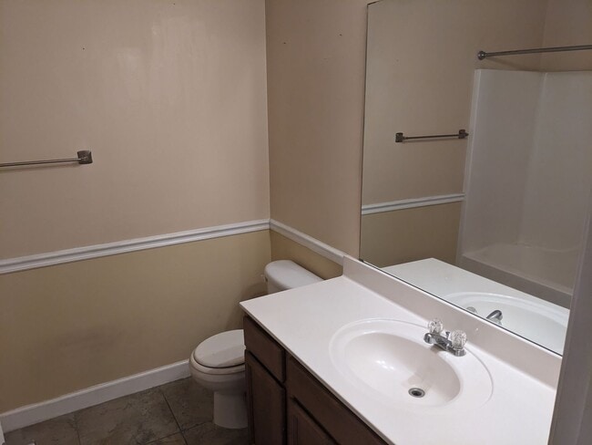 Building Photo - Townhouse with Pool Access. Assigned parking!