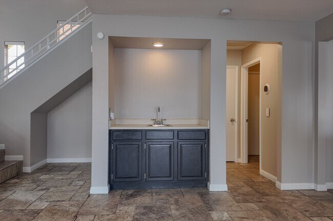 Building Photo - Modern Comfort with Pool & Spa in The Lakes – Solar Equipped Home