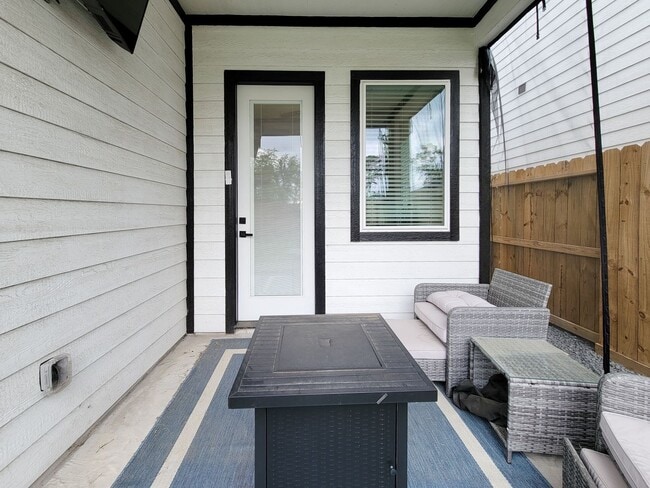 Building Photo - This 4-bedroom, 3-bathroom, two-story residence comes with a generous two-car attached garage. Re...