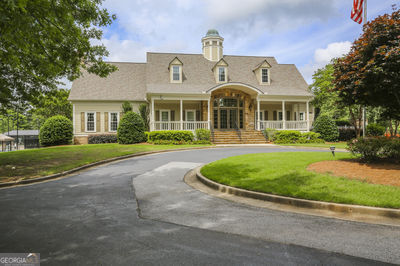 Building Photo - 9485 Nesbit Lakes Dr