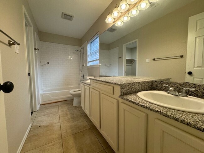 Building Photo - Updated Austin's Colony 4 bedroom 2.5 bath...