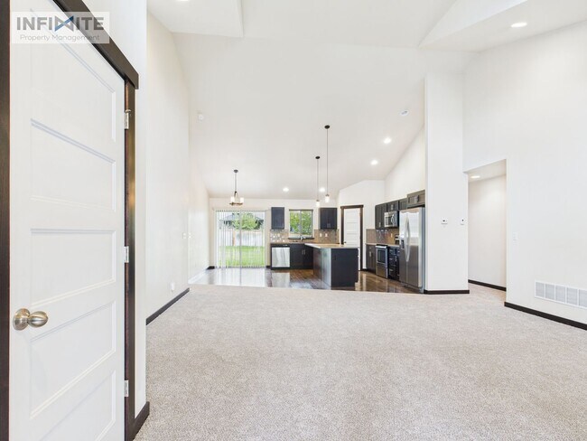 Building Photo - Single-Level 4BR with 3-Car Garage & Fence...